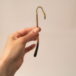 Metalen boekenlegger met gekleurd zwaantje