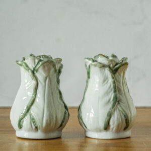 Keramiek peper en zoutstel in de vorm van kooltjes met goudaccenten