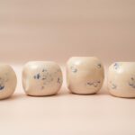 Set van 4 keramieken pinguïn vazen van Keraliek, wit met blauwe bubbels