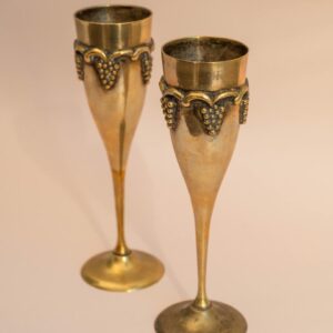 Set van 2 vintage messing champagneglazen met druiven