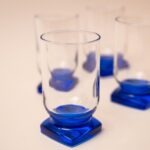Set van 4 Bormioli Rocco glazen met blauwe vierkante voet