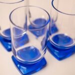 Set van 4 Bormioli Rocco glazen met blauwe vierkante voet